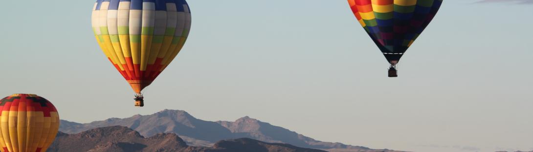 balloons above the desert